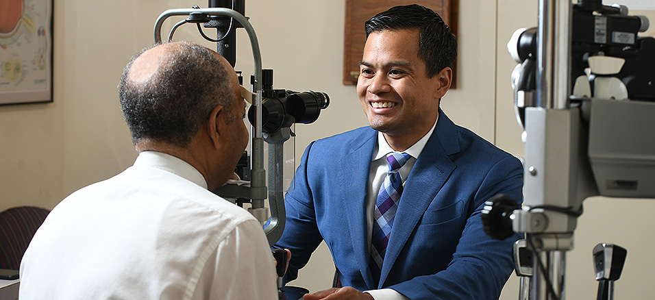 Dr. Puente examines a patient